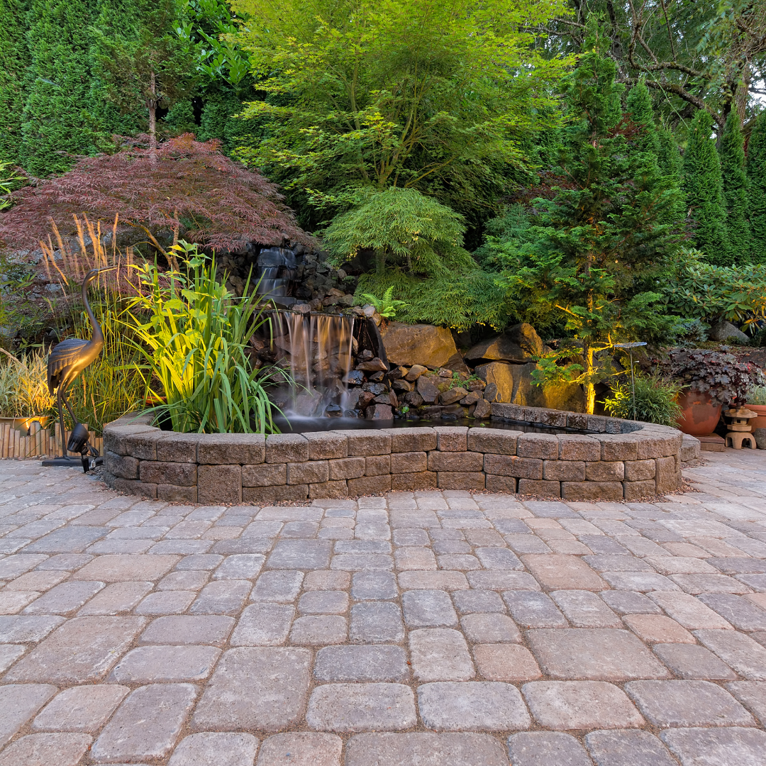 Sealed concrete paver driveway restored by JJ Power Washing in Denver, CO