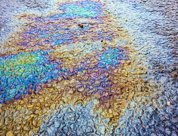 High-pressure gum removal from a Denver storefront sidewalk